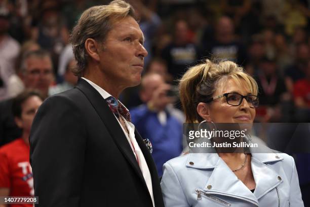 Republican U.S. House candidate former Alaska Gov. Sarah Palin stands with her boyfriend former-NHL star Ron Duguay during a "Save America" rally at...