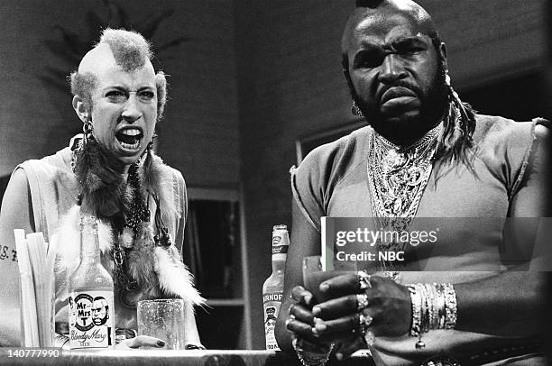 Episode 2 -- Pictured: Robin Duke as Mrs. T, Mr. T as himself during the 'Mr. & Mrs. T Bloody Mary Mix' skit on October 2, 1982 -- Photo by: Alan...