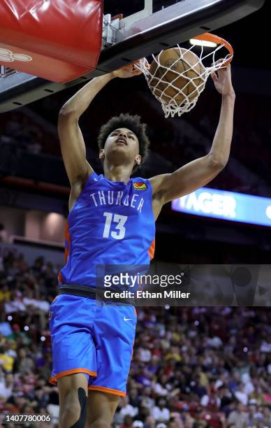Ousmane Dieng of the Oklahoma City Thunder dunks against the Houston Rockets during the 2022 NBA Summer League at the Thomas & Mack Center on July...