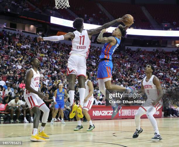 Tari Eason of the Houston Rockets blocks a shot by Tre Mann of the Oklahoma City Thunder during the 2022 NBA Summer League at the Thomas & Mack...