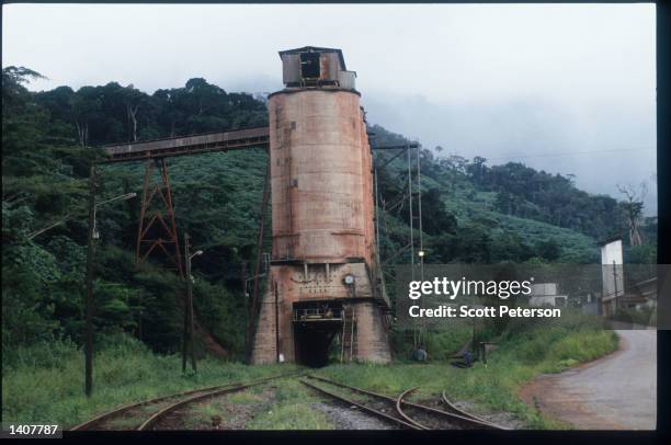 Man walks at Yekepa Mine August 10, 1992 in Liberia. The National Patriotic Front of Liberia , which rebelled against the Doe government in 1989...