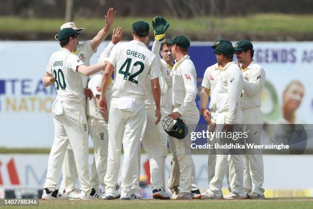 Australian players celebrate dismissing Kusal Mendis of Sri Lanka during day three of the Second Test in the series between Sri Lanka and Australia...