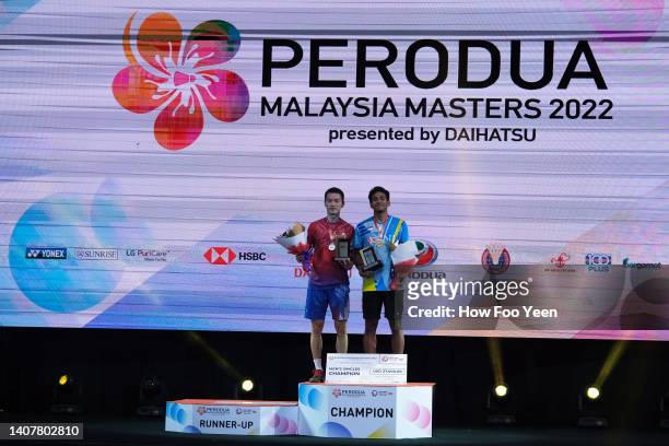 Chico Aura DWI Wardoyo of Indonesia poses with his trophy after winning the final against Ng Ka Long of Hong Kong on day six of the Perodua Malaysia...