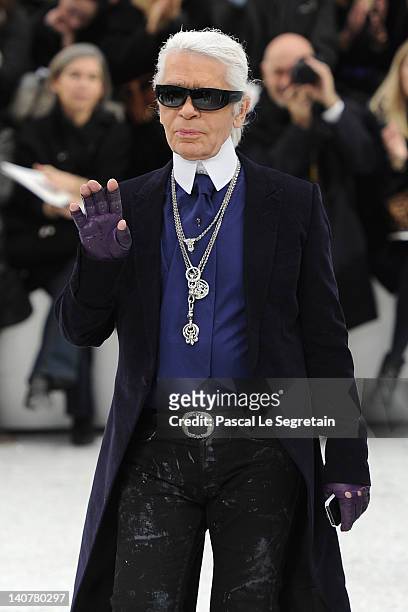 Designer Karl Lagerfeld acknowledges the applause of the audience after the Chanel Ready-To-Wear Fall/Winter 2012 show as part of Paris Fashion Week...