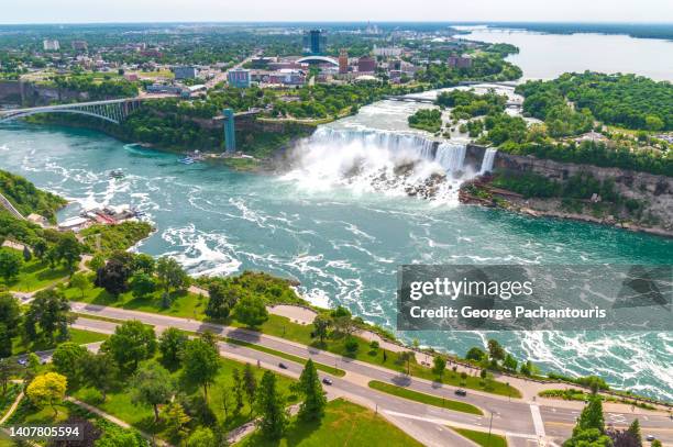 high angle view of the american and bridal veil waterfalls in niagara falls - grenzbaum stock-fotos und bilder