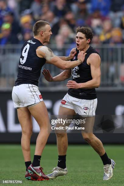 Charlie Curnow of the Blues celebrates a goal with Patrick Cripps during the round 17 AFL match between the West Coast Eagles and the Carlton Blues...