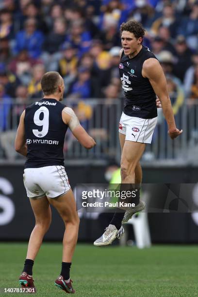 Charlie Curnow of the Blues celebrates a goal with Patrick Cripps during the round 17 AFL match between the West Coast Eagles and the Carlton Blues...