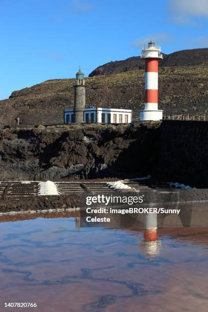 crystal pools of the salt works in fuencaliente at the punta de fuencaliente, lighthouses at the southern tip of the island, la palma, canary island, spain - salt flat stock illustrations