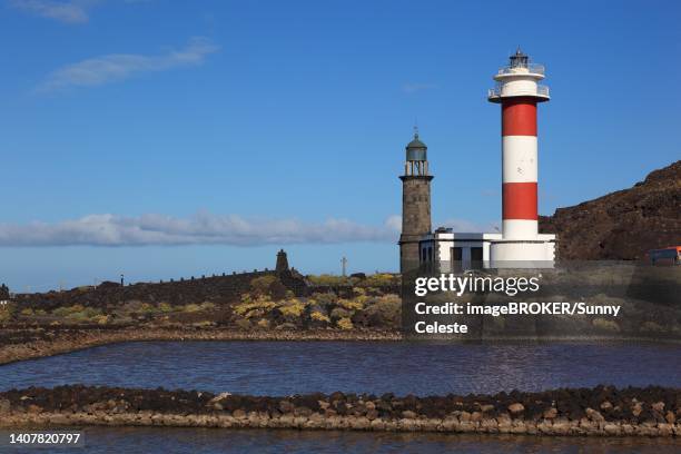 crystal pools of the salt works in fuencaliente at the punta de fuencaliente, lighthouses at the southern tip of the island, la palma, canary island, spain - salt flat stock illustrations