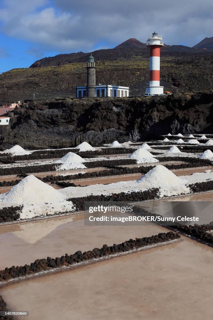 Crystal pools and salt mountains in the Fuencaliente salt flats at Punta de Fuencaliente, lighthouses at the southern tip of the island, La Palma, Canary Island, Spain