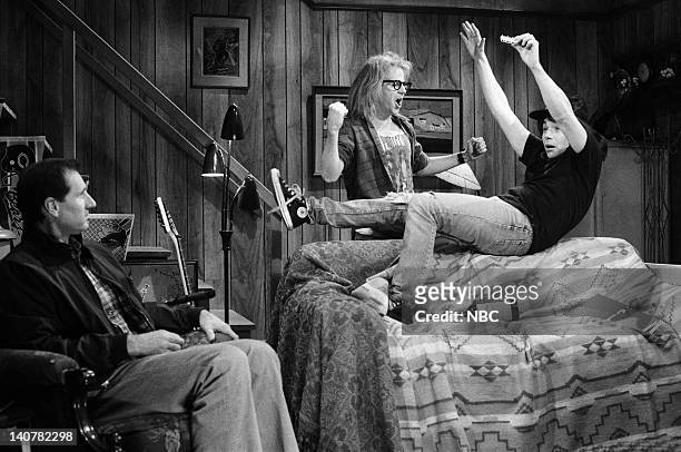 Episode 10 -- Pictured: Ed O'Neill as Mr. Hemple, Dana Carvey as Garth Algar, Mike Myers as Wayne Campbell during the 'Wayne's World' skit on January...