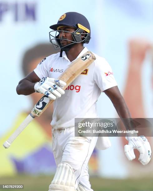 Kamindu Mendis of Sri Lanka celebrates after marking 50 runs during day three of the Second Test in the series between Sri Lanka and Australia at...