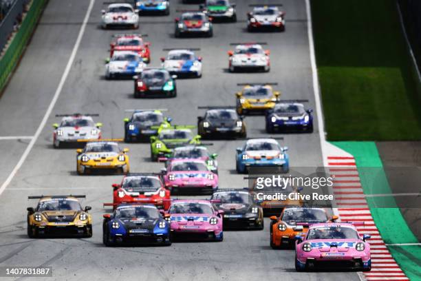 Dylan Pereira of Luxembourg and BWT Lechner Racing leads the field into turn one at the start during the Round 4 race of the Porsche Mobil 1 Supercup...