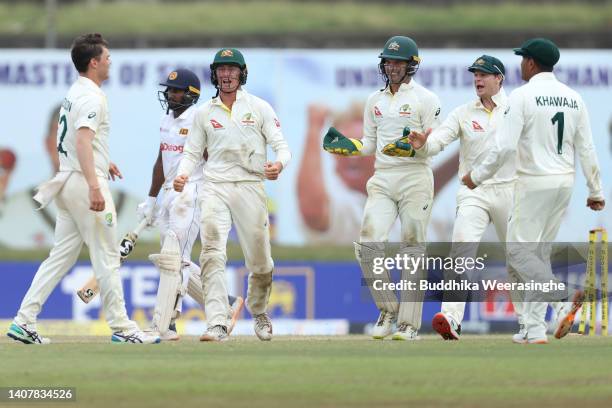 Australian players celebrate after dismissing Kamindu Mendis of Sri Lanka during day three of the Second Test in the series between Sri Lanka and...