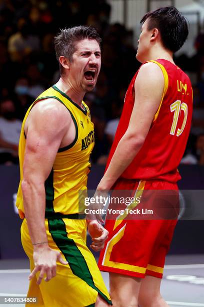 Greg Hire of Australia celebrates after defeating China in their men's semifinal game during the FIBA 3x3 Asia Cup at Marina Bay Sands on July 10,...