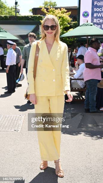 Poppy Delevingne attends The Wimbledon Men's Singles Final at the All England Lawn Tennis and Croquet Club on July 10, 2022 in London, England.