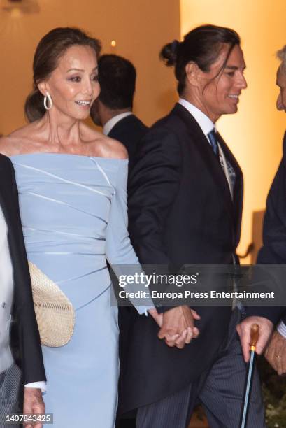 Isabel Preysler and Julio Jose Iglesias leave the church after the wedding of Alvaro Castillejo and Cristina Fernandez, on July 9 in Sotogrande,...