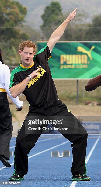 Prince Harry poses at the Usain Bolt Track at the University of the West Indies on March 6, 2012 in Kingston, Jamaica. Prince Harry is in Jamaica as...