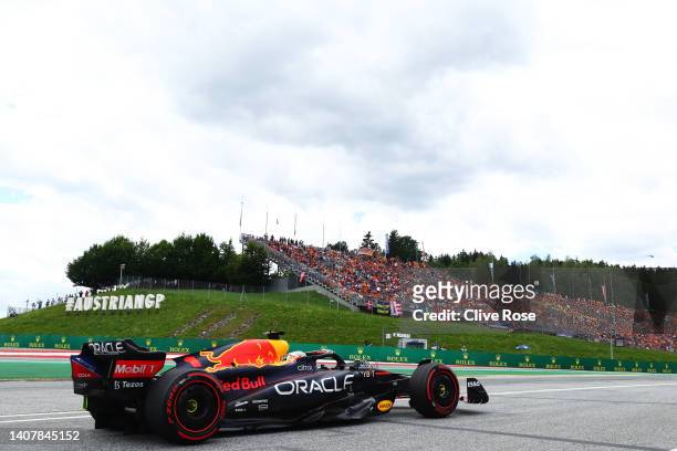 Max Verstappen of the Netherlands driving the Oracle Red Bull Racing RB18 on his way to the grid ahead of the F1 Grand Prix of Austria at Red Bull...