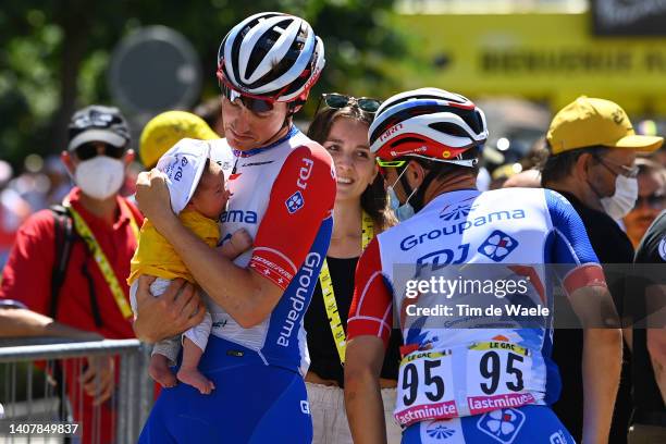 Stefan Küng of Switzerland and Team Groupama - FDJ and his son Noé and wife Céline meet Olivier Le Gac of France and Team Groupama - FDJ prior to the...