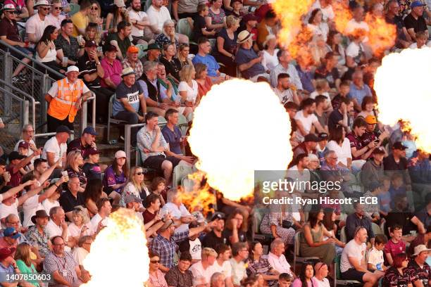 Spectators look on during a pyrotechnics display during the Vitality T20 Blast Quarter Final between Somerset and Derbyshire Falcons at The Cooper...