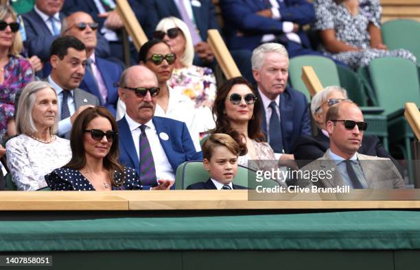 Catherine, Duchess of Cambridge, Prince George of Cambridge and Prince William, Duke of Cambridge are seen in the Royal Box watching Novak Djokovic...