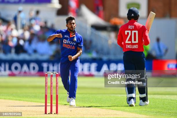 Umran Malik of India celebrates taking the wicket of Jason Roy of England during the 3rd Vitality IT20 match between England and India at Trent...