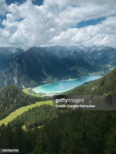 view of the achensee and the karwendel mountains | tyrol, austria - karwendel mountains stock pictures, royalty-free photos & images