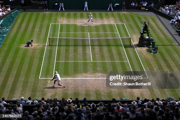 General view as Nick Kyrgios of Australia plays a backhand against Novak Djokovic of Serbia during their Men's Singles Final match on day fourteen of...