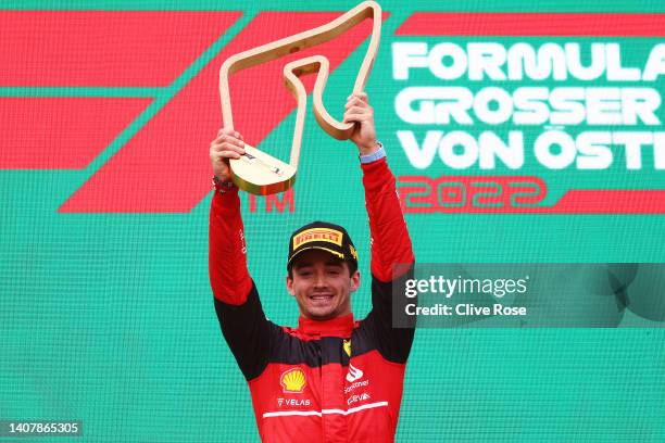 Race winner Charles Leclerc of Monaco and Ferrari celebrates on the podium during the F1 Grand Prix of Austria at Red Bull Ring on July 10, 2022 in...