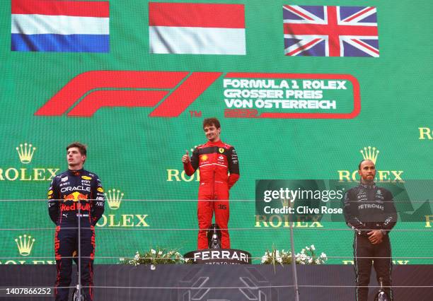 Race winner Charles Leclerc of Monaco and Ferrari , Second placed Max Verstappen of the Netherlands and Oracle Red Bull Racing and Third placed Lewis...