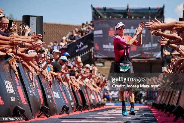 Daniela Ryf of Switzerland finishes first during the IRONMAN Switzerland Thun Women's Pro Race on July 10, 2022 in Bern, Switzerland.