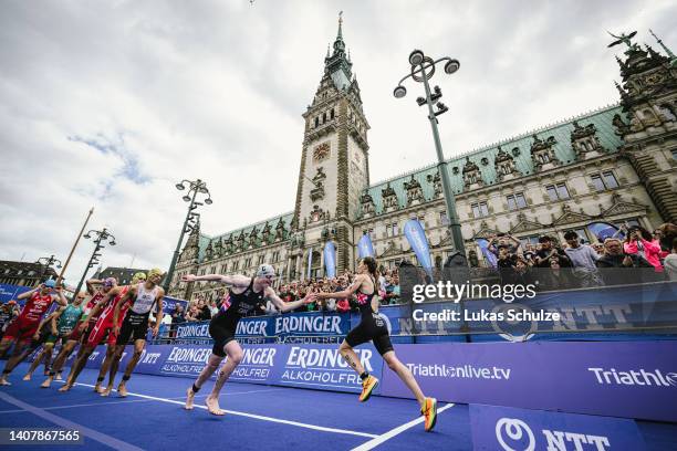 Athletes perform in the run leg of ITU World Triathlon Elite Mixed Team Relay during the Hamburg Wasser World Triathlon on July 10, 2022 in Hamburg,...