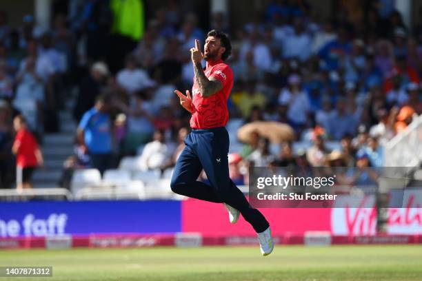 Reece Topley of England celebrates taking the wicket of Rishabh Pant of India during the 3rd Vitality IT20 match between England and India at Trent...