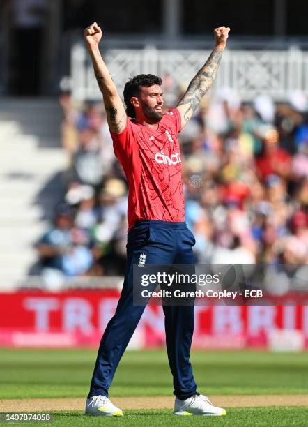 Reece Topley of England celebrates the wicket of Rohit Sharma of India during the 3rd Vitality IT20 match between England and India at Trent Bridge...