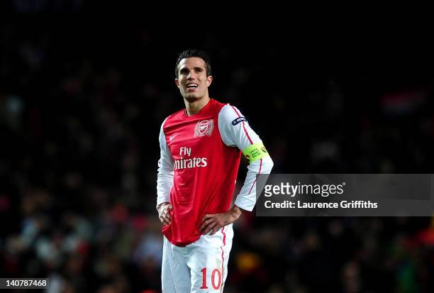 Robin van Persie of Arsenal looks on dejected at the final whistle during the UEFA Champions League Round of 16 second leg match between Arsenal and...