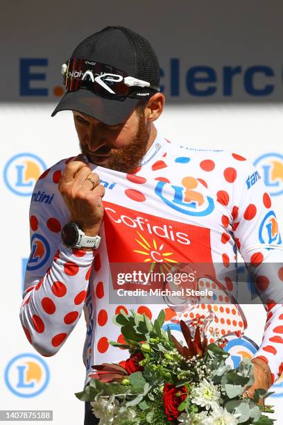 Simon Geschke of Germany and Team Cofidis celebrates winning the Polka Dot Mountain Jersey on the podium ceremony after the 109th Tour de France...
