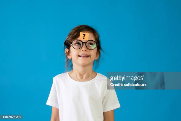 question mark with cute girl - genius stock pictures, royalty-free photos & images