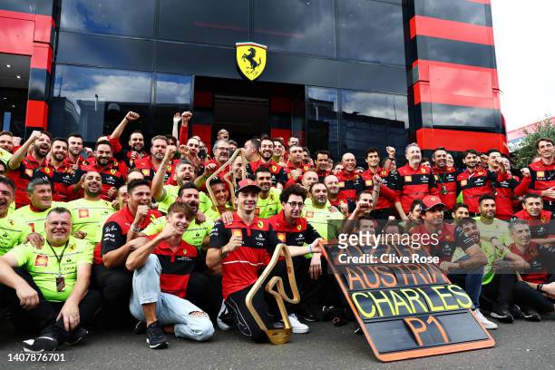 Race winner Charles Leclerc of Monaco and Ferrari celebrates with his team after the F1 Grand Prix of Austria at Red Bull Ring on July 10, 2022 in...