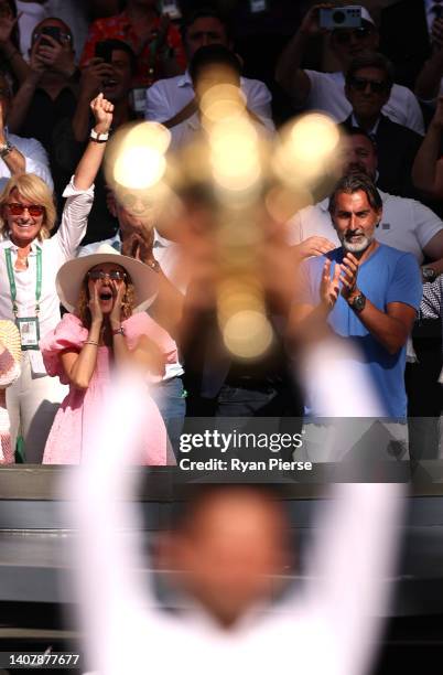 Jelena Djokovic, wife of Novak Djokovic of Serbia, celebrates as Novak Djokovic lifts the trophy following his victory against Nick Kyrgios of...
