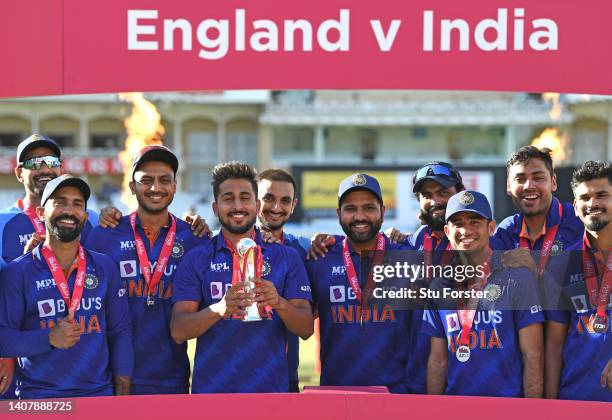 India players celebrate the series win with the trophy after the third Vitality T20 match between England and India at Trent Bridge on July 10, 2022...