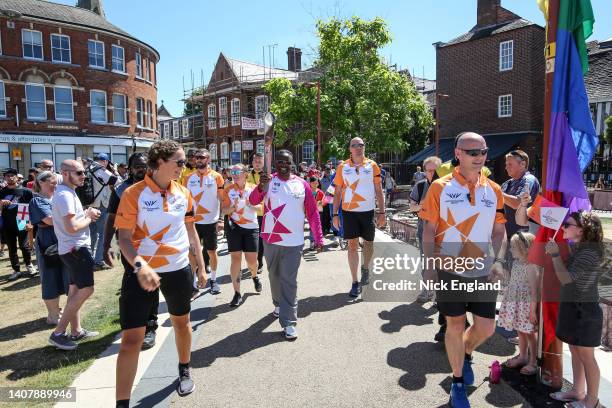 Baton bearer Elisha Shamba holds the Queen's Baton during the Birmingham 2022 Queen's Baton Relay on a visit to Leicester, United Kingdom, on July...