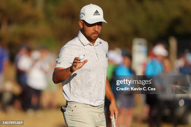 Xander Schauffele of the United States reacts to a birdie putt on the 16th green during Day Four of the Genesis Scottish Open at The Renaissance Club...