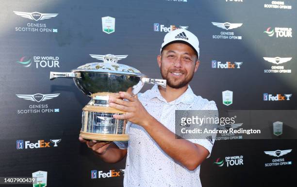 Xander Schauffele of United States poses with the Genesis Scottish Open Trophy after victory on Day Four of the Genesis Scottish Open at The...