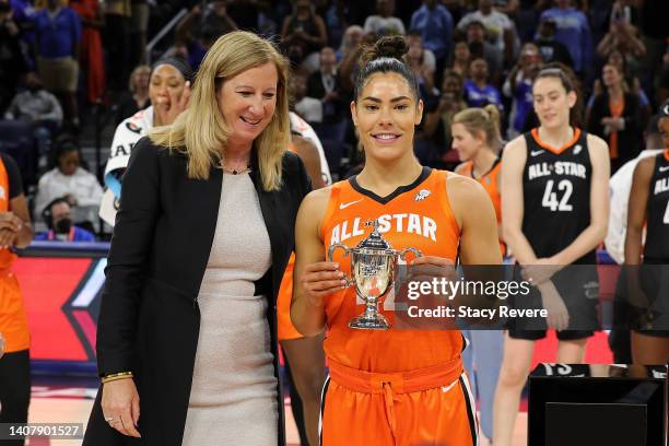 Kelsey Plum of Team Wilson is presented with the MVP trophy during the 2022 AT&T WNBA All-Star Game at the Wintrust Arena on July 10, 2022 in...