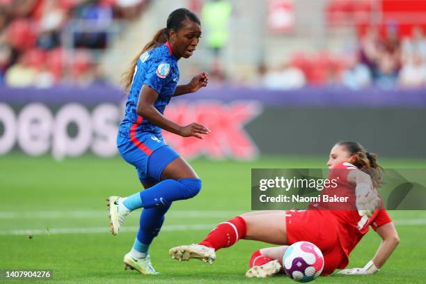 Grace Geyoro of France takes the ball around Laura Giuliani of Italy while on the way to scoring their side's fourth goal during the UEFA Women's...