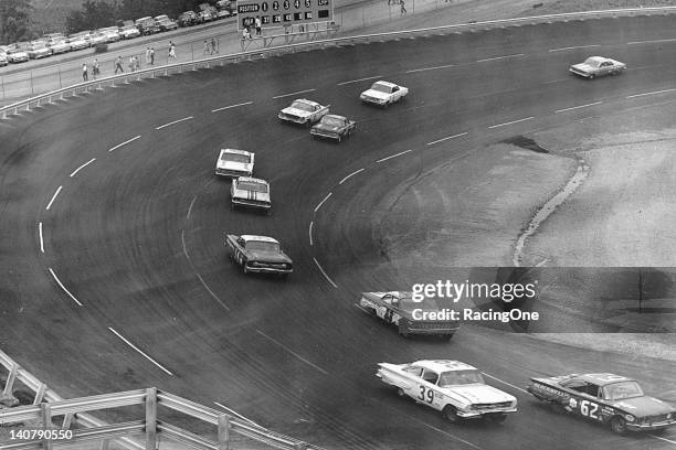 July 30, 1961: Action during the first race to be held at the new Bristol International Raceway, the Volunteer 500 NASCAR Cup race. Curtis Crider ,...