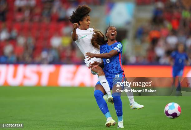 Sara Gama of Italy fouls Grace Geyoro of France and is shown a red card by match referee Rebecca Welch which is later overturned following a VAR...