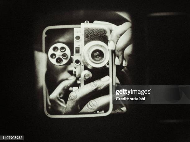 the photographer. - vintage film poster stock pictures, royalty-free photos & images