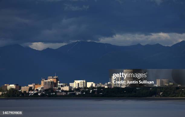 View of the downtown skyline with mountains in the rear on July 10, 2022 in Anchorage, Alaska.